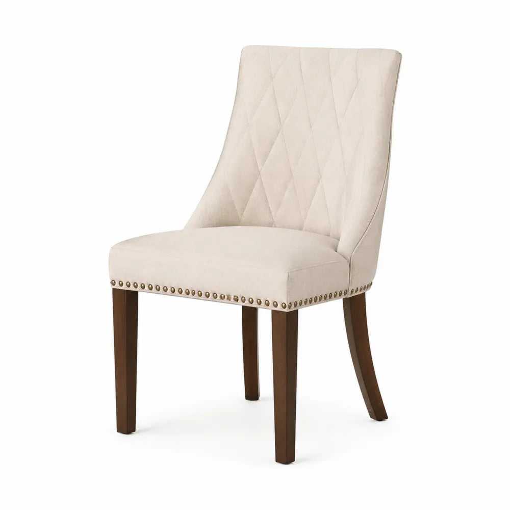 Sedia da pranzo imbottita 52 x 60 x 86 cm in tessuto poliestere beige con schienale trapuntato gambe in legno noce e borchie oro